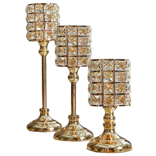 Elegant three-piece golden candle holders perfect for a romantic candlelight dinner golden candle candle decoration.
