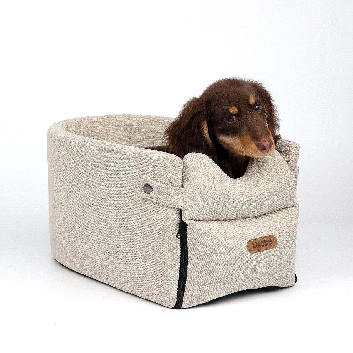 Cozy Car Central Dog Car Seat Bed, a portable carrier for small dogs and cats, ensuring safe travel in style.